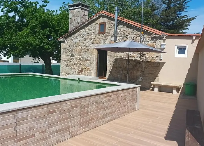 A Caseta De Mourelle בית נופש Amés