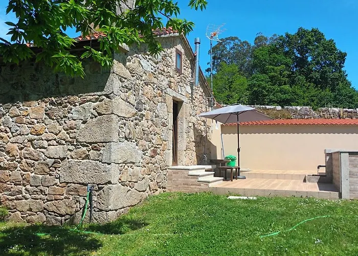 A Caseta De Mourelle בית נופש Amés